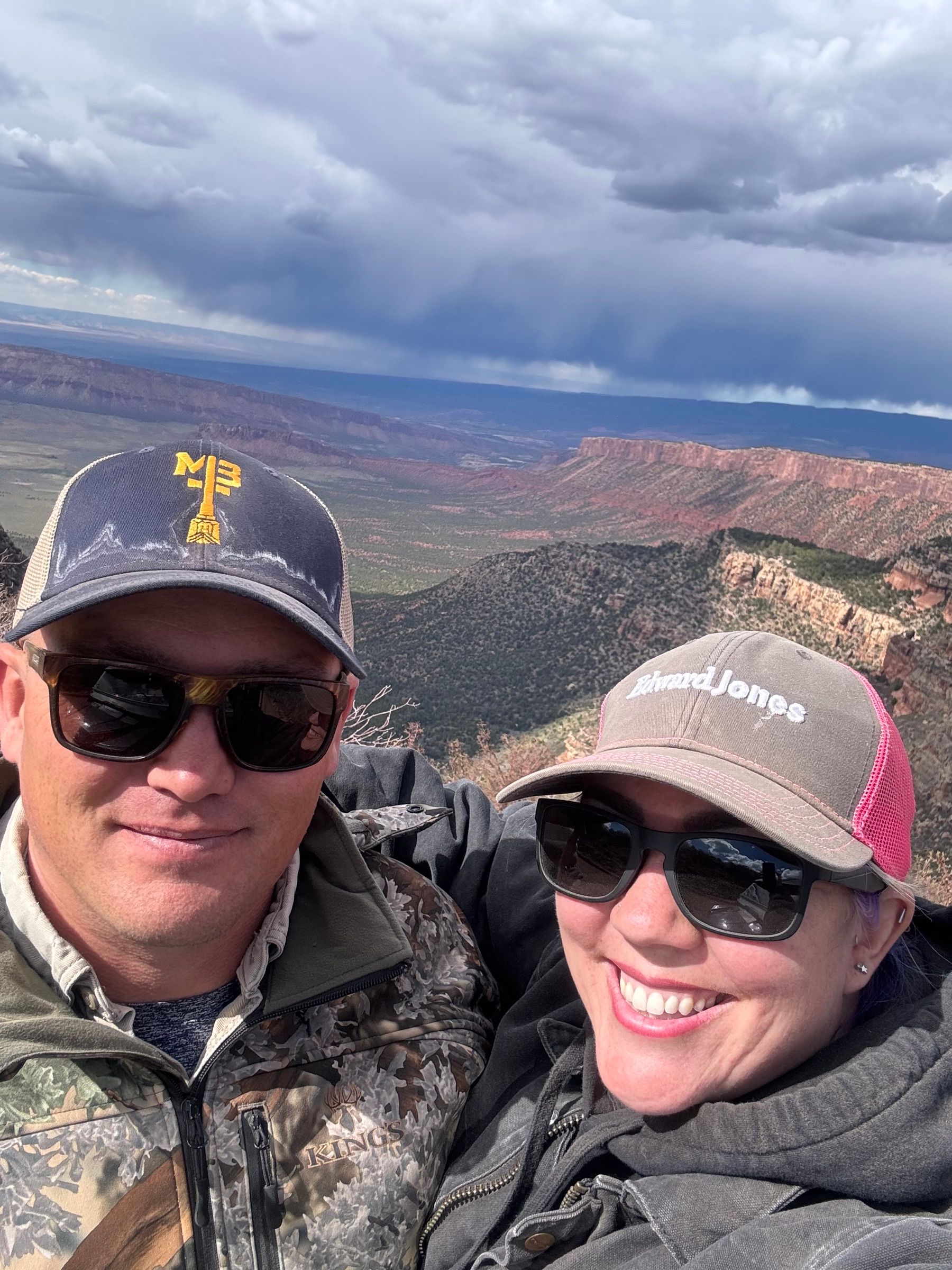 Shalee Holland hiking in the red rock high country above Moab