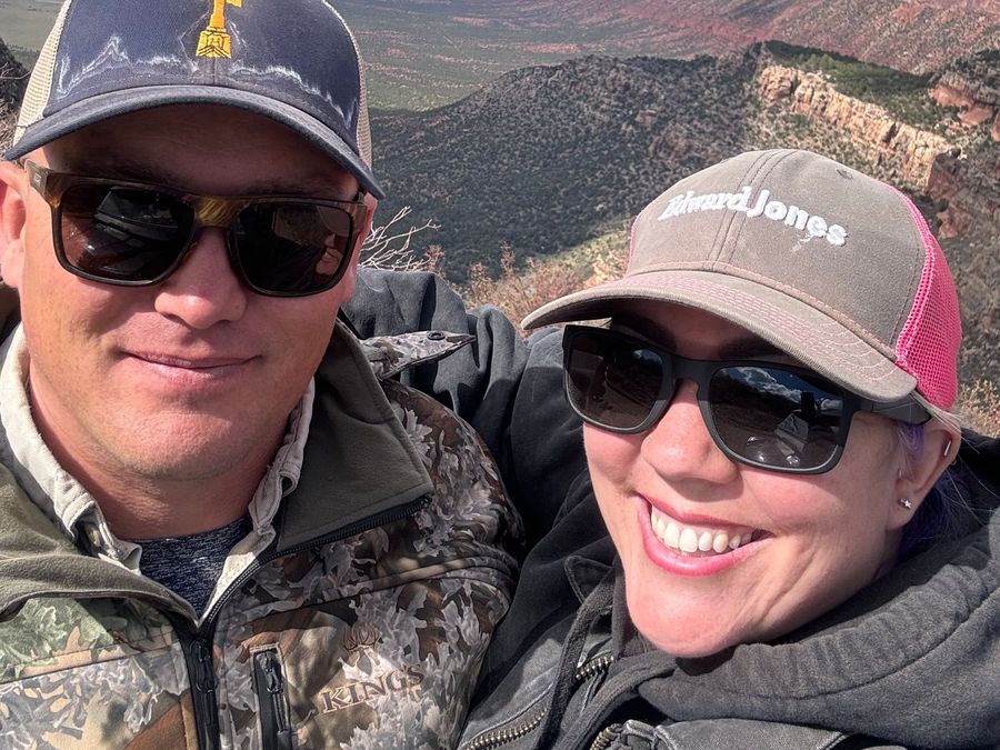 Shalee Holland hiking in the red rock high country above Moab